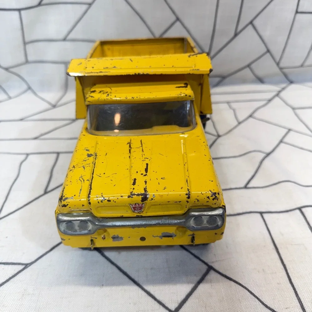 Ny-Lint Ford Dump Truck OS Yellow Vintage Pressed Steel Toy No. 1600
